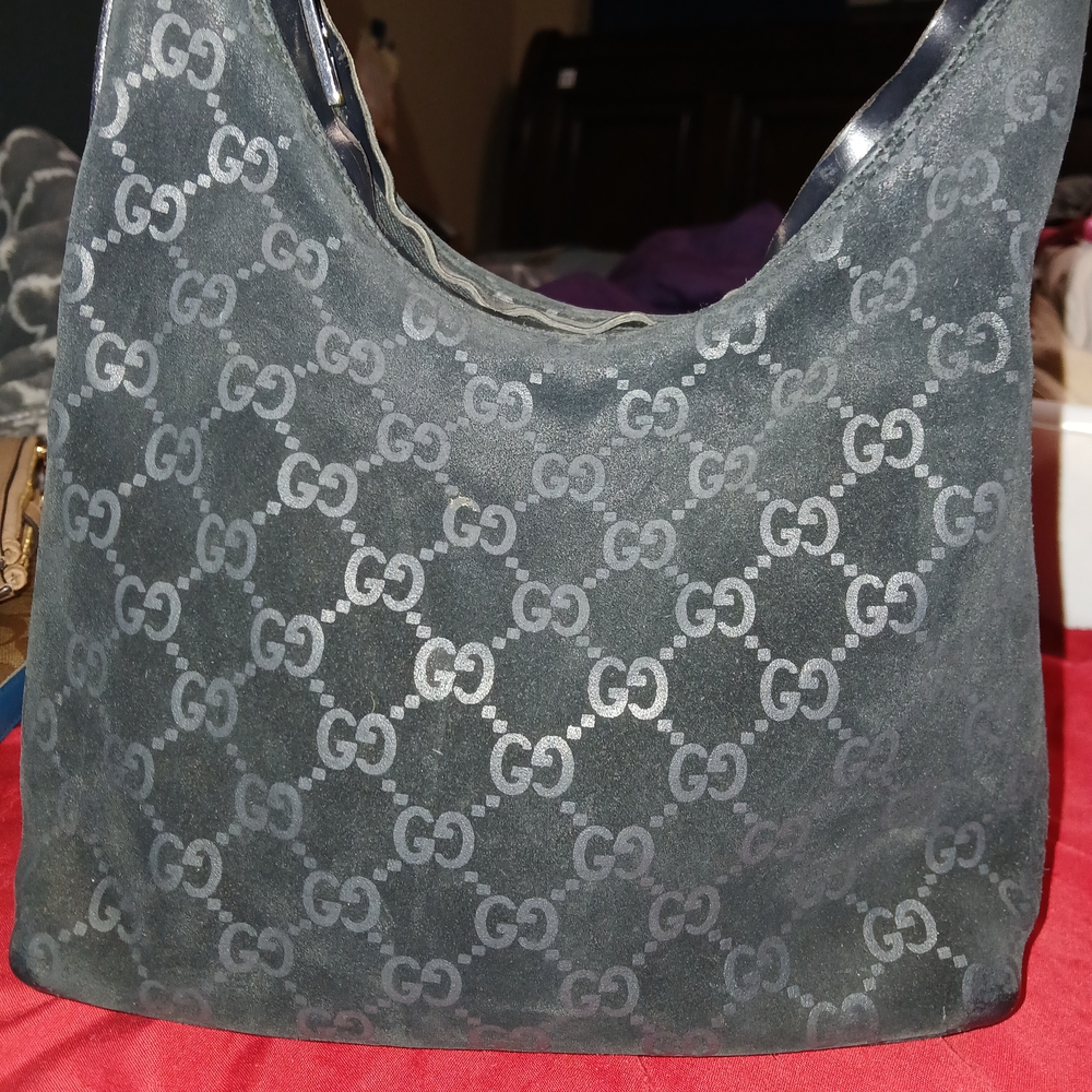 Gucci Black Hobo Bag with Iconic Monogram Design